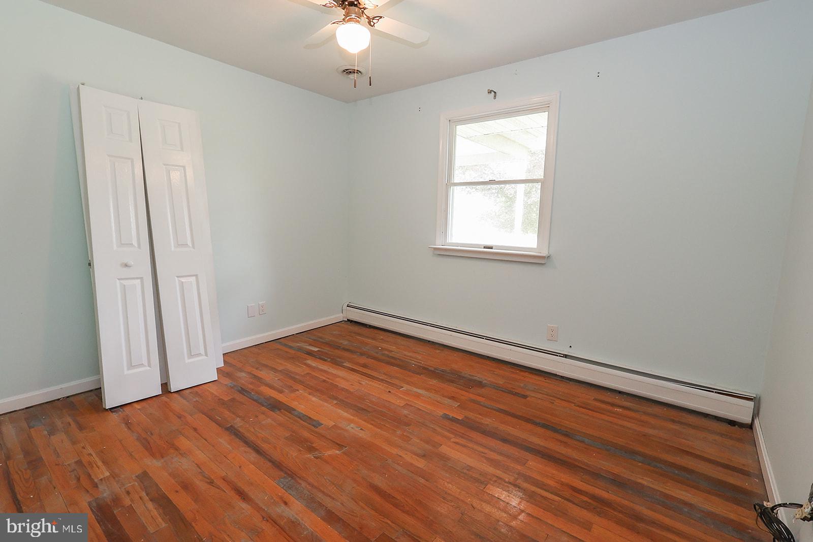 48146 Mallard View Lane St. Inigoes, MD 20684 - Photo 27 of 46 Bright and airy room with hardwood floors.