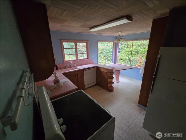 a living room with furniture and a bathtub