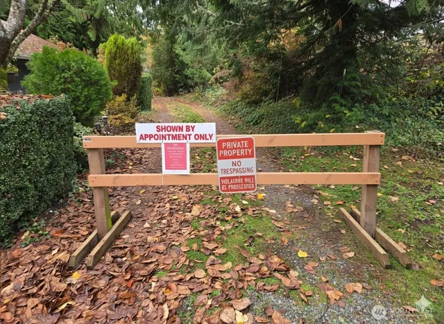 a sign that is on the side of a road