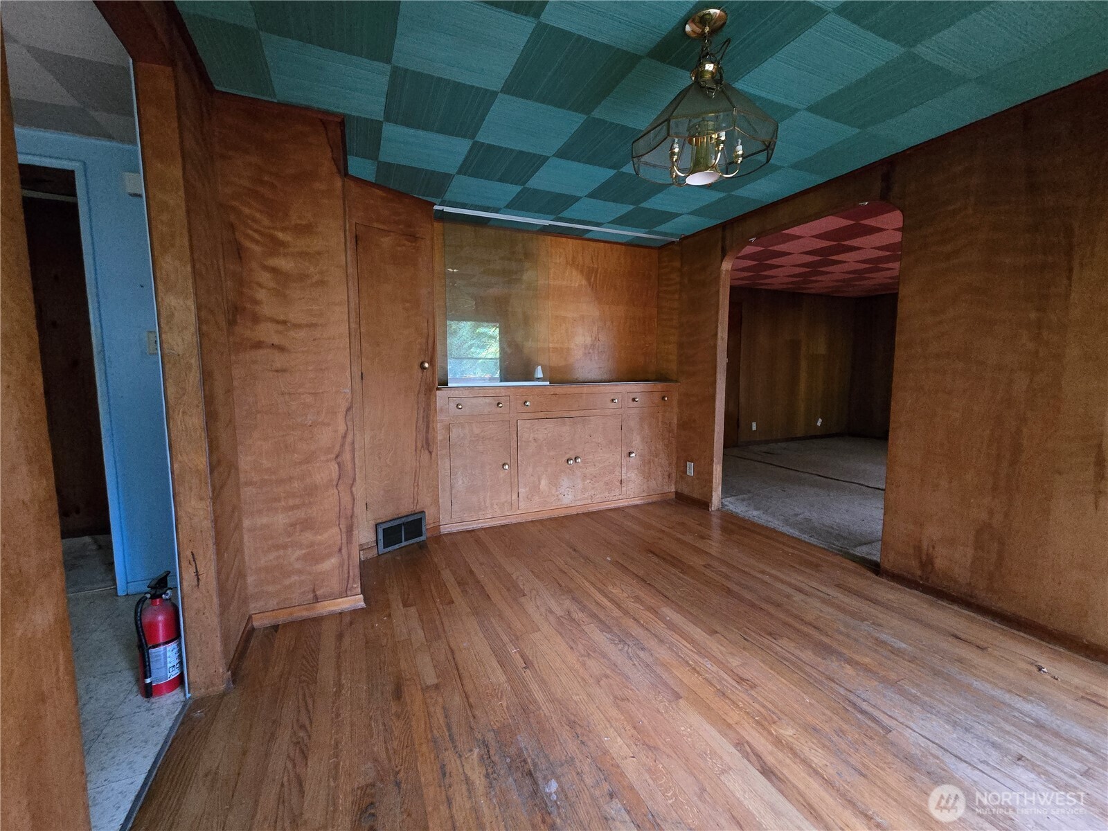 10415 Slater Avenue Northeast Kirkland, WA 98033 - Photo 27 of 38 an empty room with wooden floor and windows