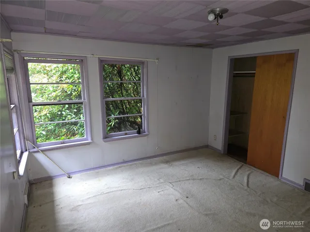 an empty room with windows