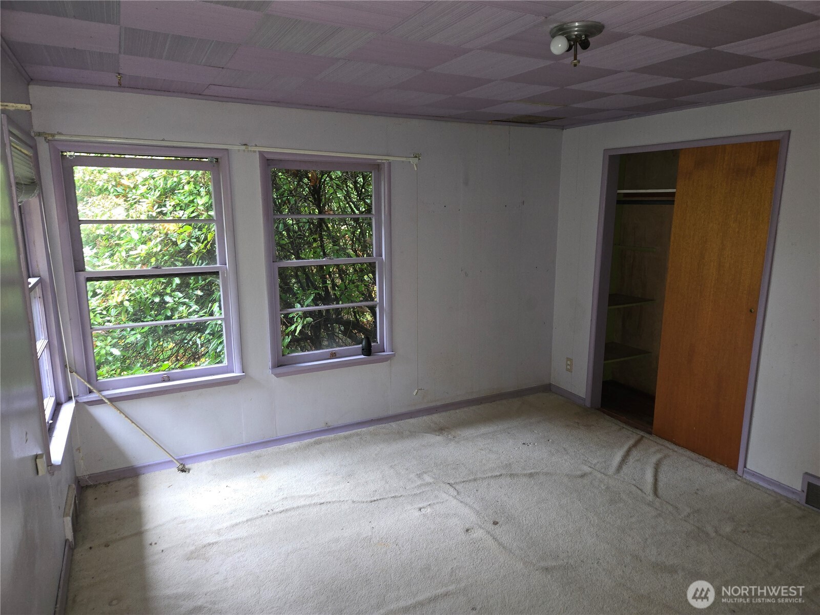 10415 Slater Avenue Northeast Kirkland, WA 98033 - Photo 28 of 38 an empty room with windows