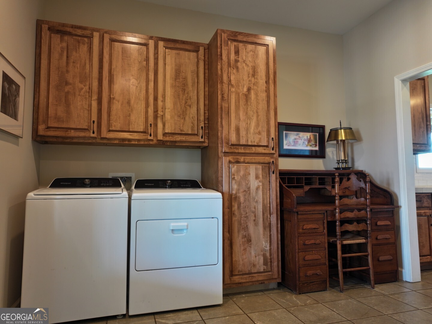 1412 Clark Road Blakely, GA 39823 - Photo 19 of 46 a view of storage and utility room with washer and dryer