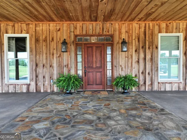 a view of a entryway door front of house