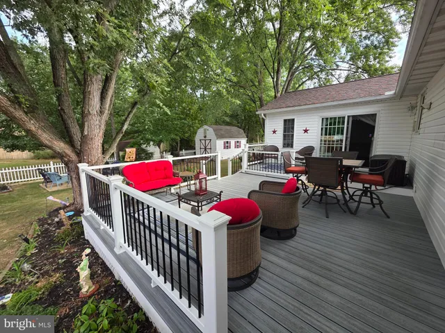a view of a patio with furniture