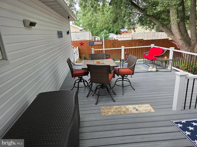 an outdoor space with furniture