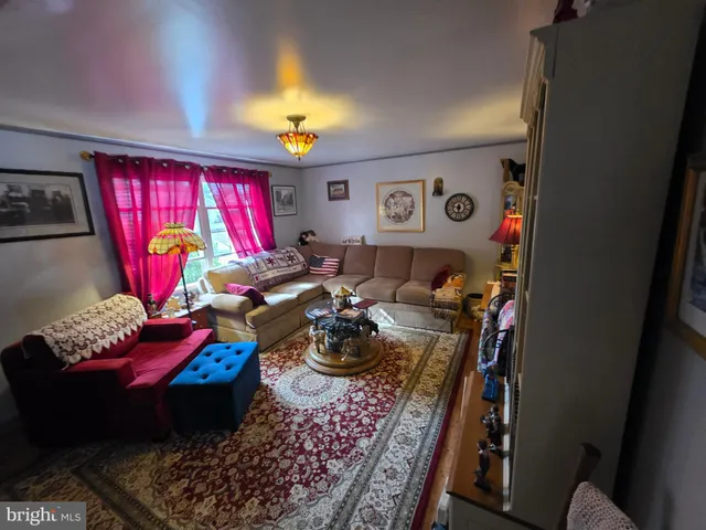 a room with furniture and rug