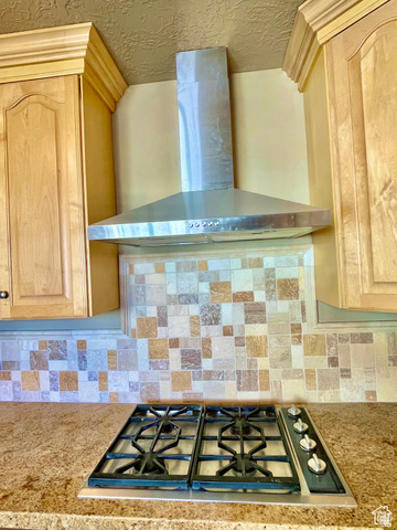 255 West Main Street Mount Pleasant, UT 84647 - Photo 15 of 35 Stainless steel range hood positioned above a gas cooktop