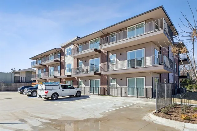 a car parked in front of a building