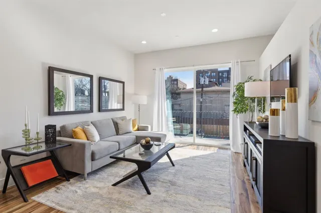 a kitchen with a sink and a refrigerator