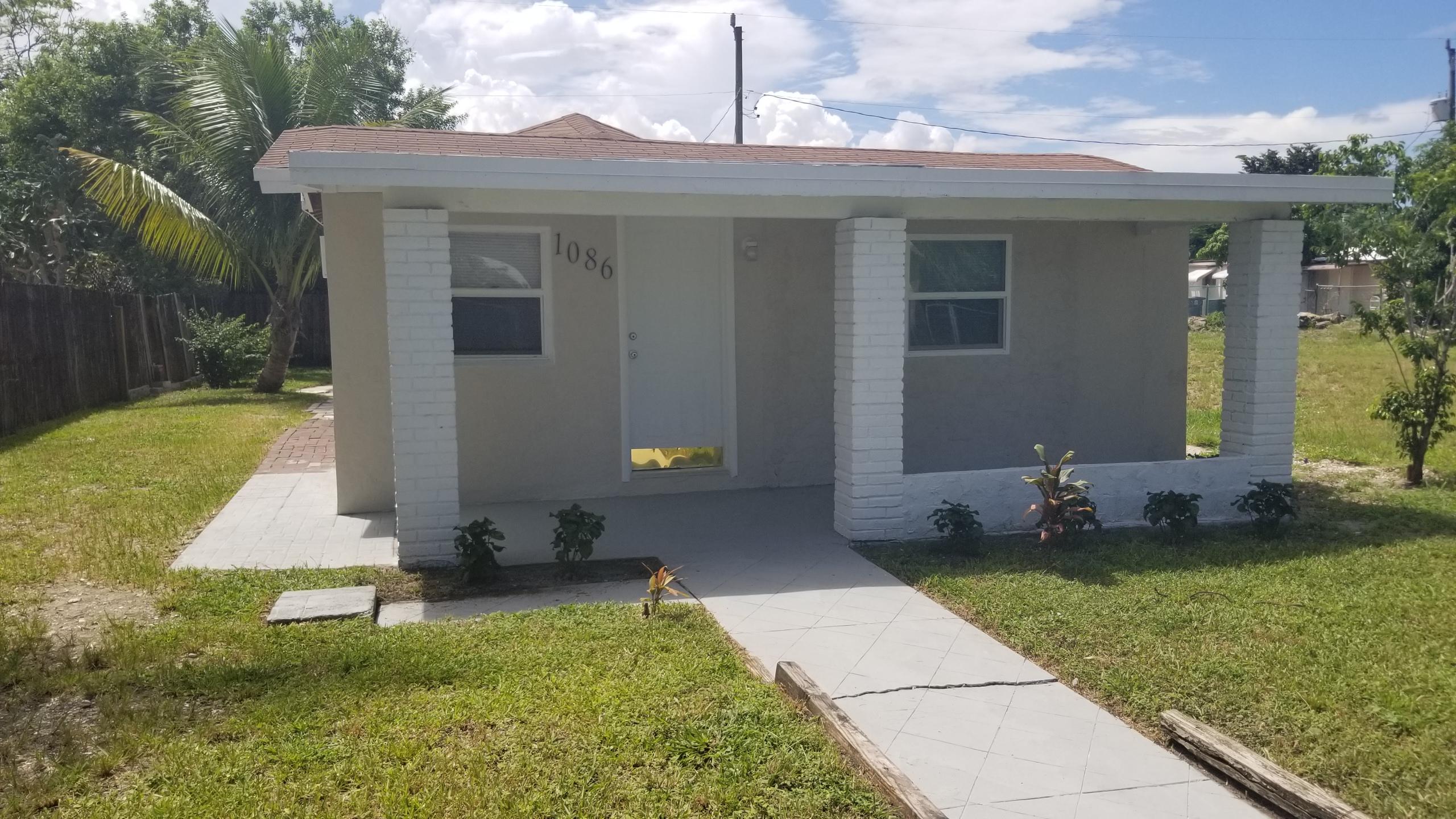 1086 Highview Road Lantana, FL 33462 - Photo 1 of 20 front