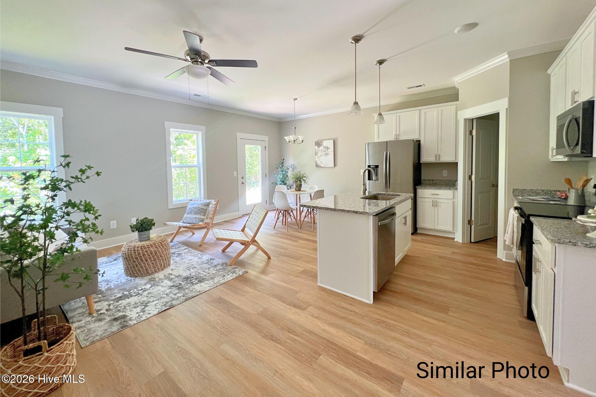 211 Holly Sands Loop Holly Ridge, NC 28445 - Photo 3 of 32 Living Room 2