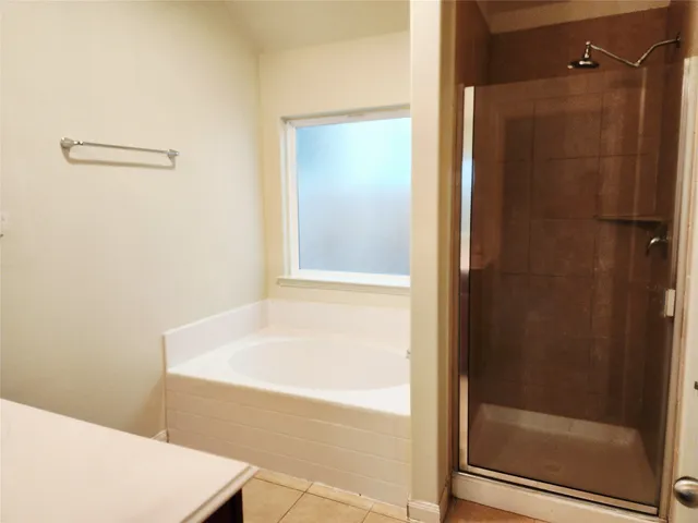 a bathroom with a sink vanity and a mirror