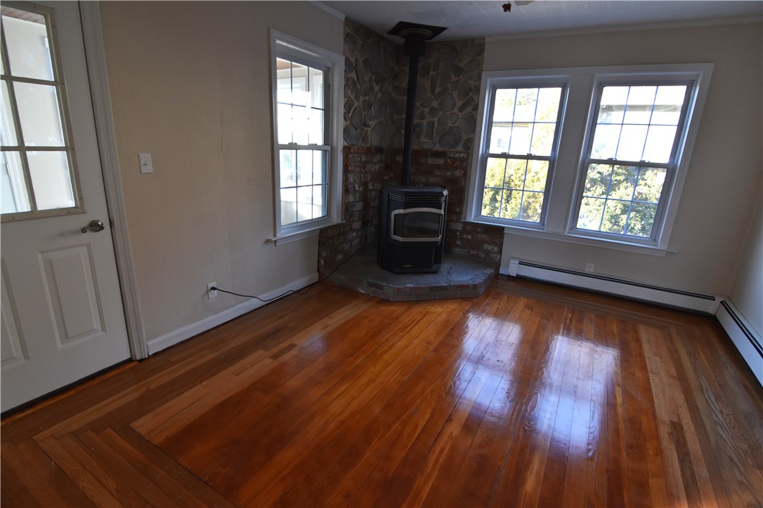 132 Division Street Woonsocket, RI 02895 - Photo 4 of 20 LIVING ROOM W PELLET STOVE