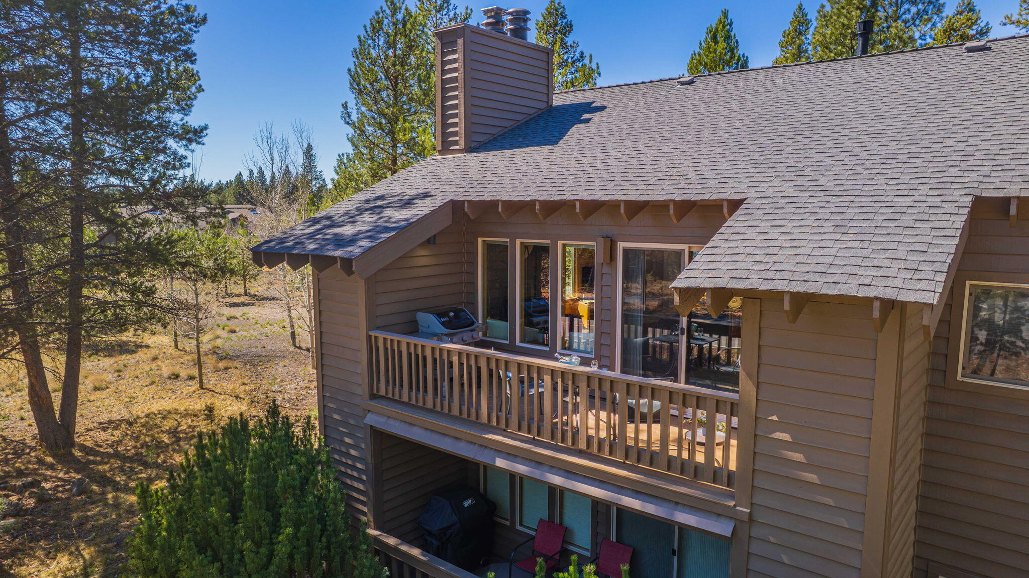 57305 Beaver Ridge Loop, Unit 8 Sunriver, OR 97707 - Photo 2 of 25 a view of a house with a window