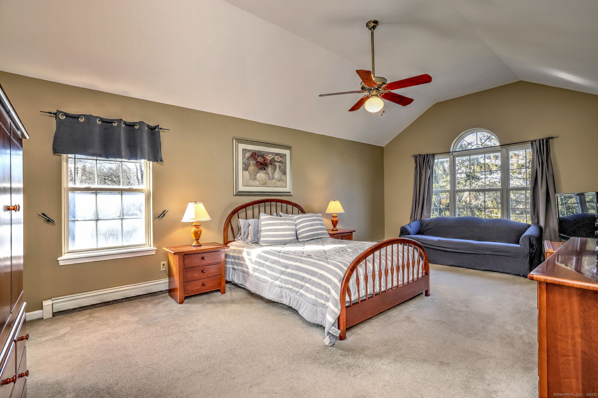 238 Turkey Roost Road Monroe, CT 06468 - Photo 19 of 34 a bedroom with a bed couch chandelier and window