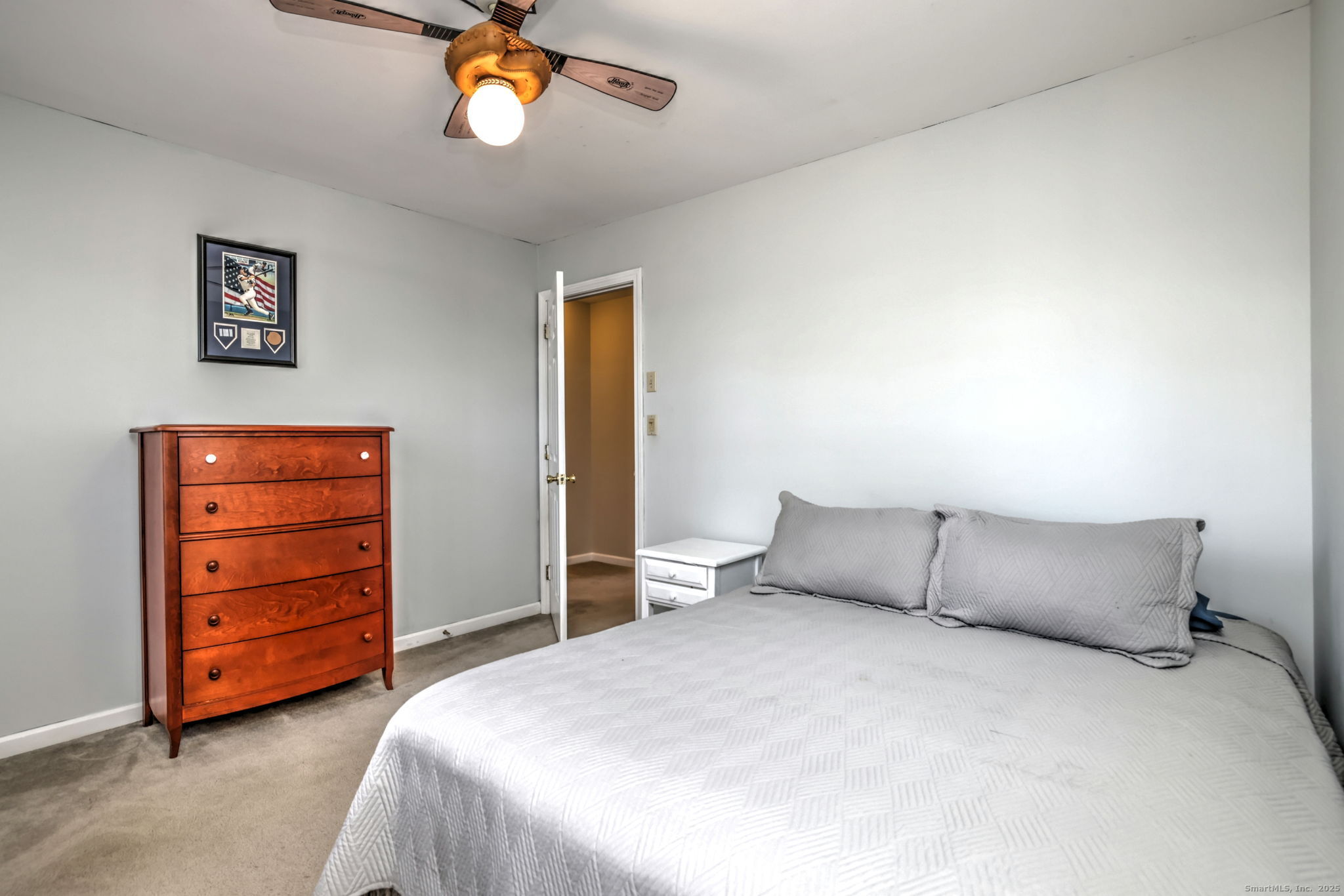 238 Turkey Roost Road Monroe, CT 06468 - Photo 23 of 34 a bedroom with a bed and a cabinets