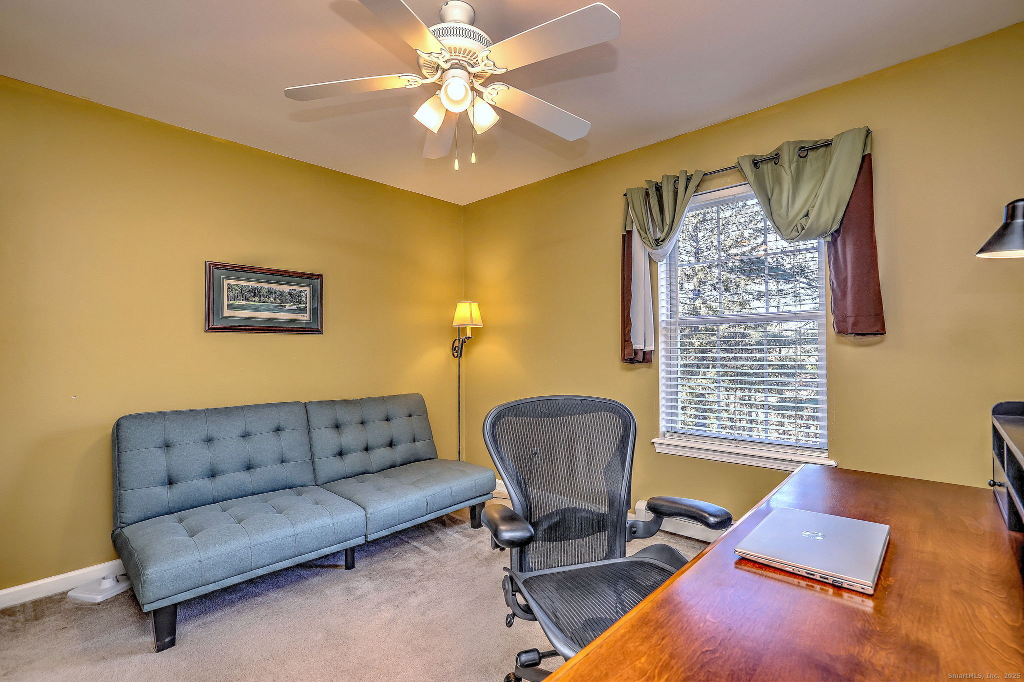 238 Turkey Roost Road Monroe, CT 06468 - Photo 27 of 34 a living room with furniture and a window