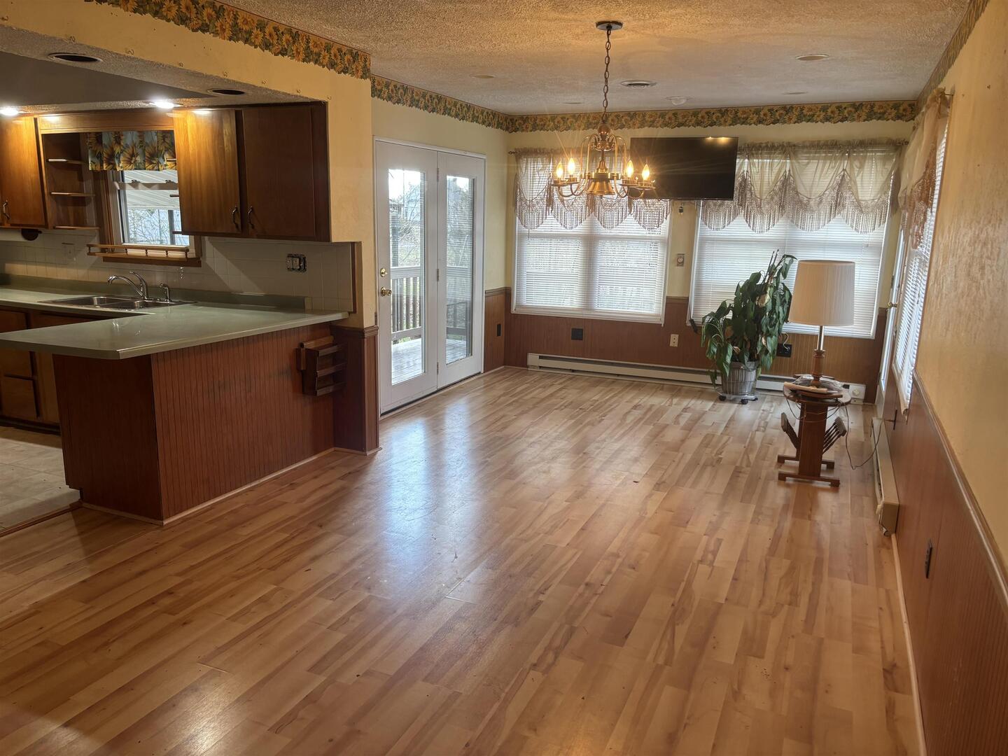 205 Jefferson Street Gorham, IL 62940 - Photo 17 of 17 a kitchen with counter top space and wooden floor