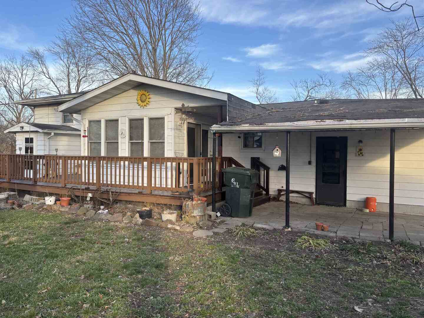 205 Jefferson Street Gorham, IL 62940 - Photo 3 of 17 a front view of a house with garden
