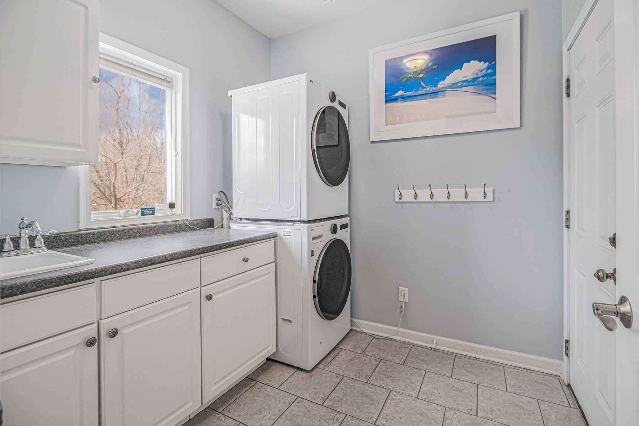 10588 Erie Drive Crown Point, IN 46307 - Photo 16 of 45 a bathroom with a sink and a mirror