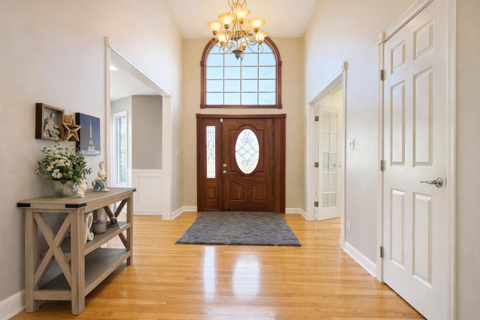 10588 Erie Drive Crown Point, IN 46307 - Photo 6 of 45 a view of an entryway with wooden floor