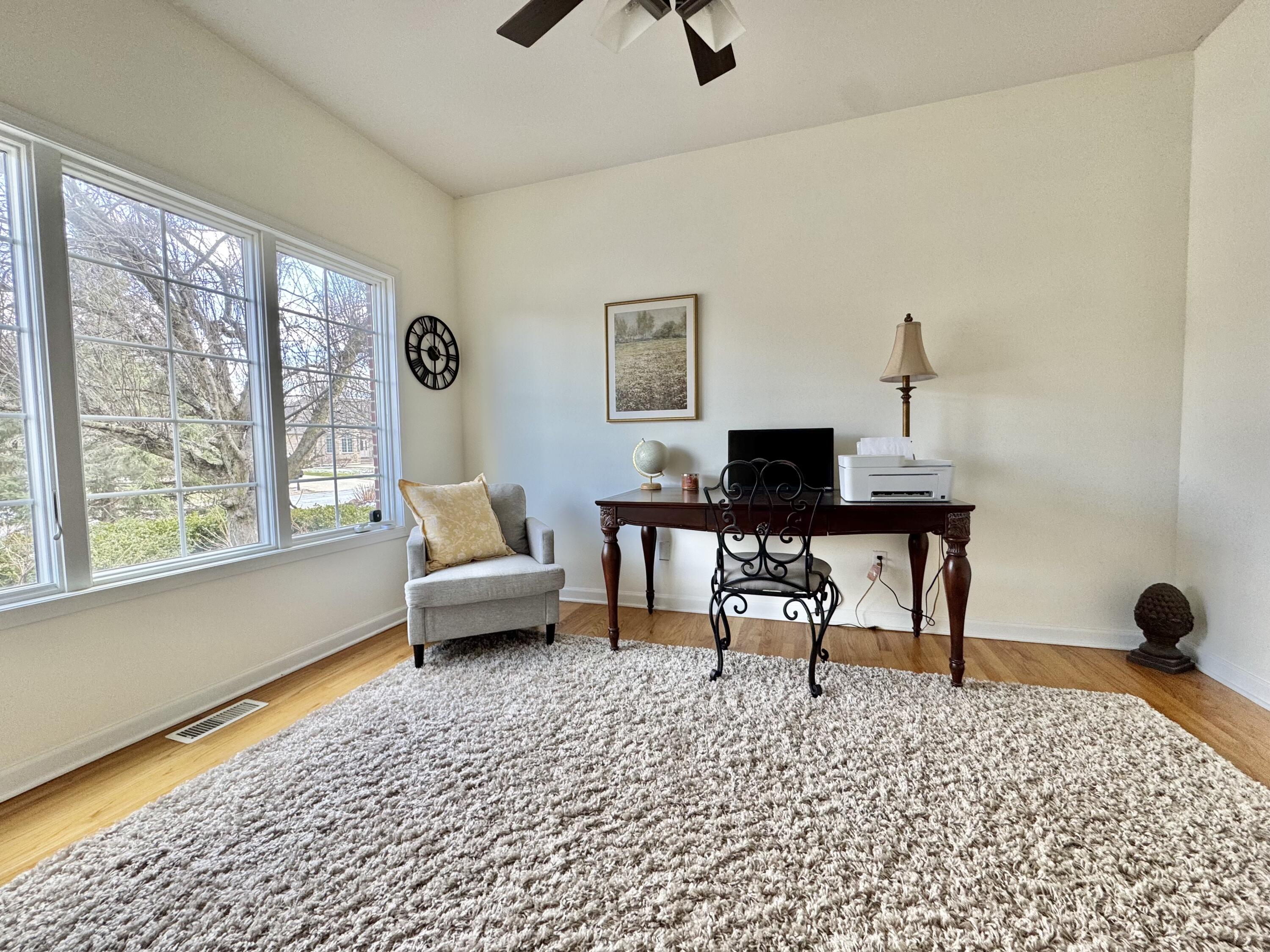 10588 Erie Drive Crown Point, IN 46307 - Photo 7 of 45 a living room with furniture and a window