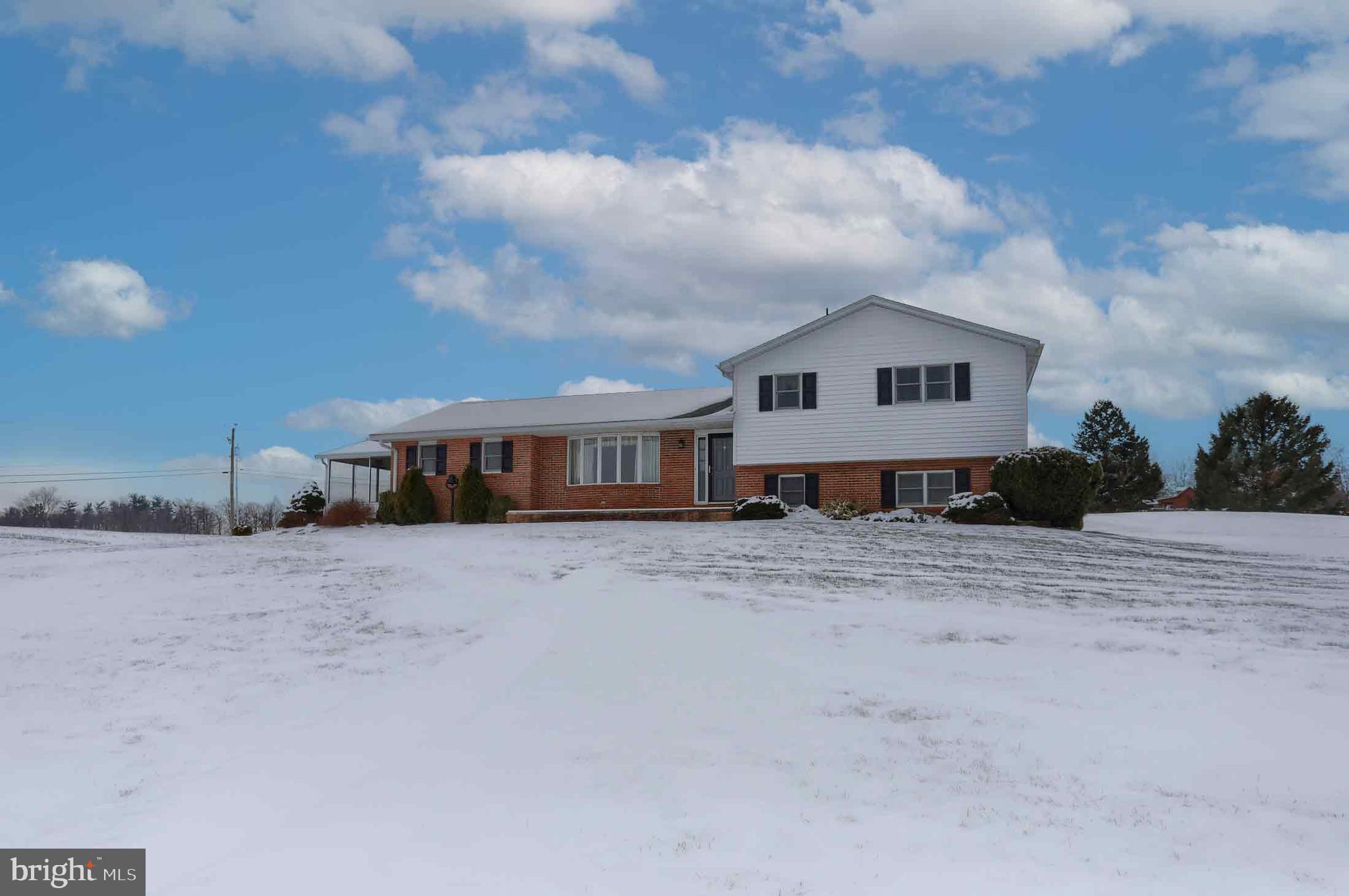 Home on 4.38 acres with 4500 sq ft Shop/Garage