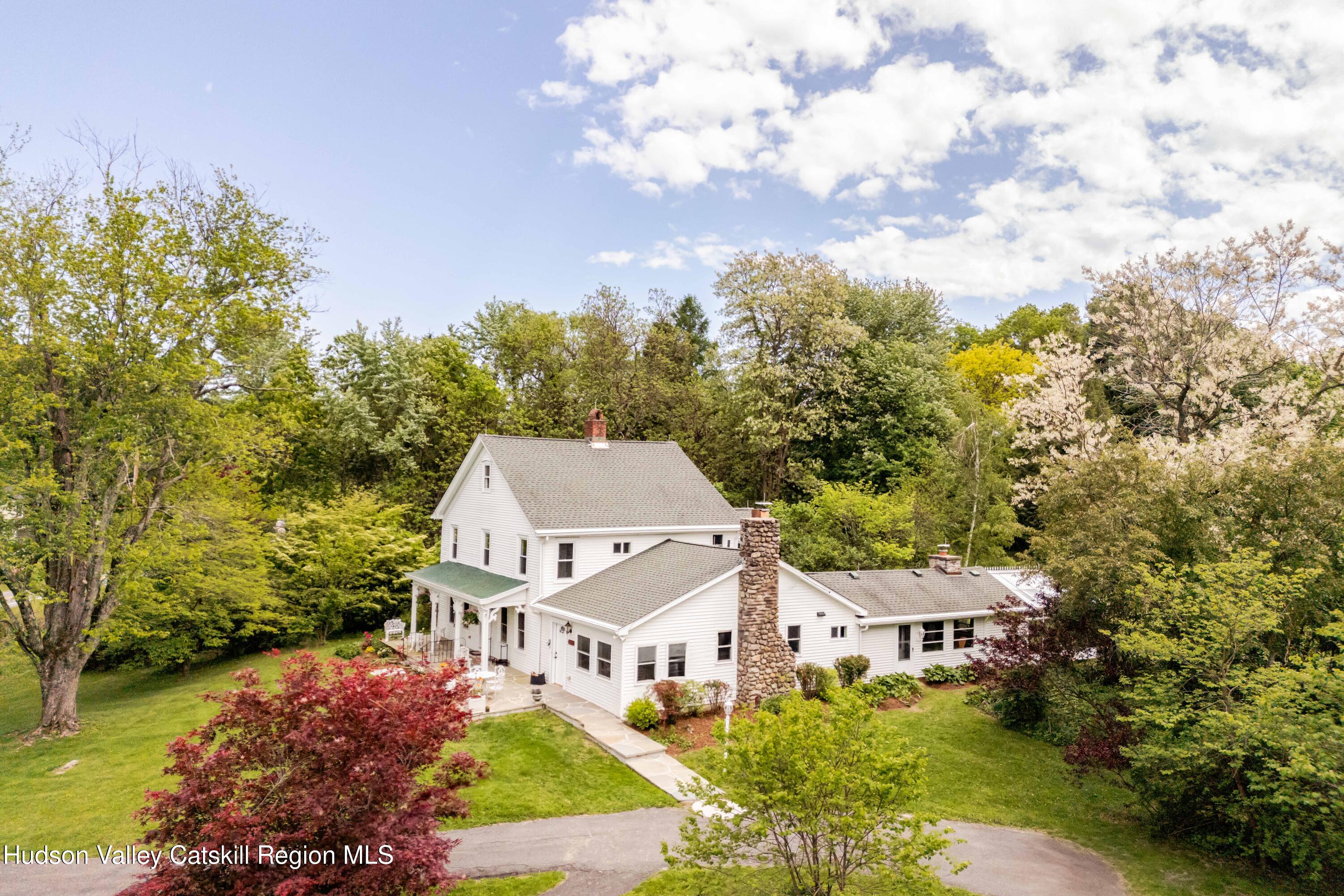 2295 State Rte 32 South New Paltz, NY 12561 - Photo 7 of 46 an aerial view of residential houses with outdoor space and trees