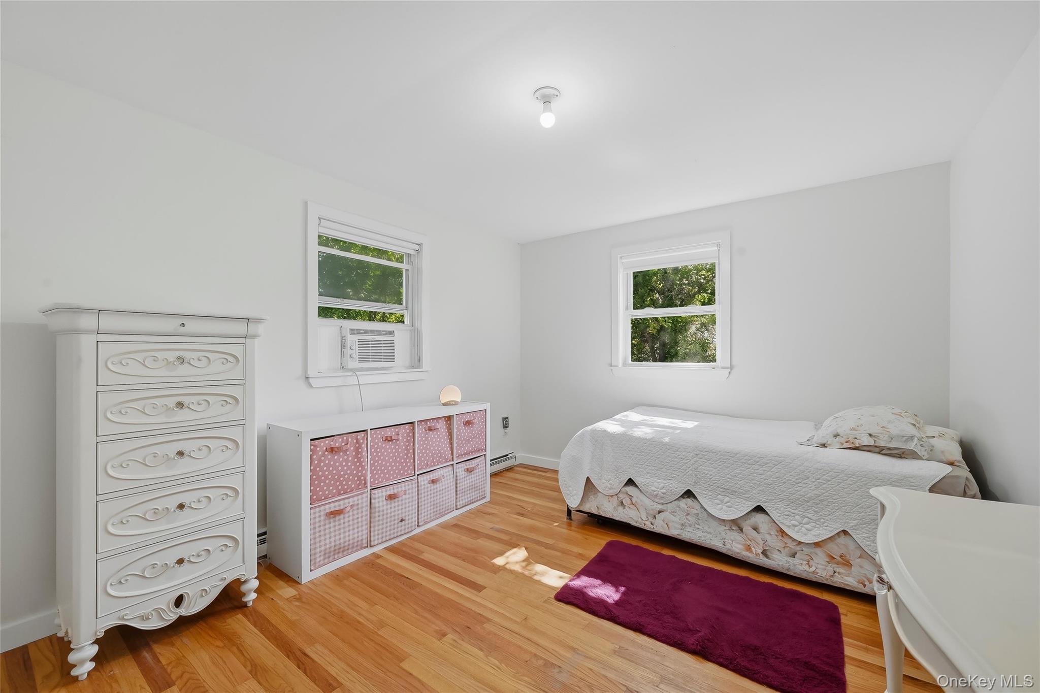 249 Ridge Road Highland Mills, NY 10930 - Photo 18 of 38 Hardwood flooring complements bright white walls