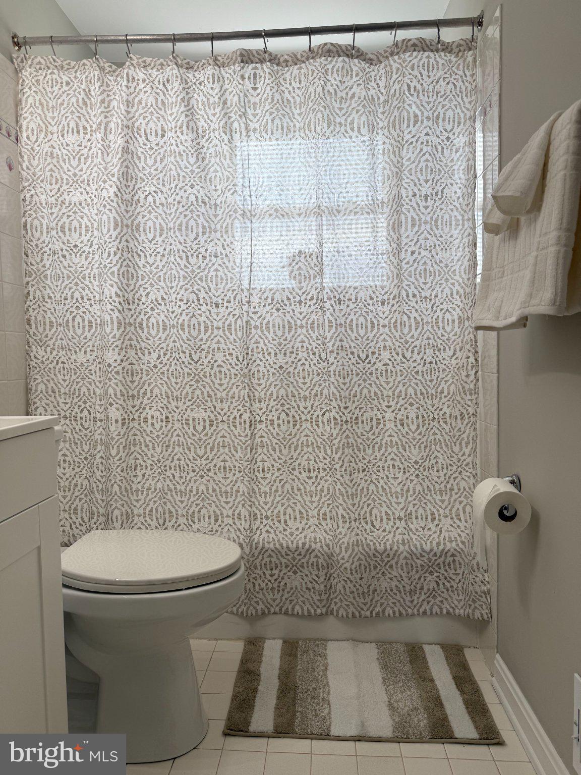 2908 Mallview Road Baltimore, MD 21230 - Photo 14 of 22 a bathroom with a toilet and a shower