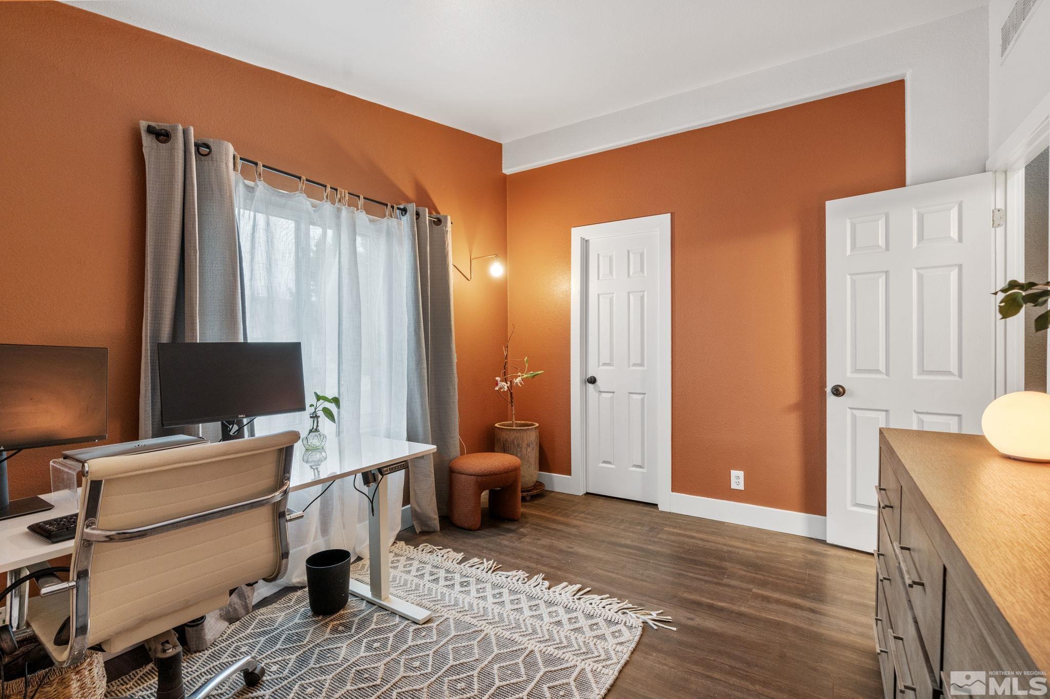 1327 Lynx Street Reno, NV 89506 - Photo 31 of 38 a bedroom with furniture and a window