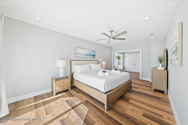 a view of a house with swimming pool and sitting area