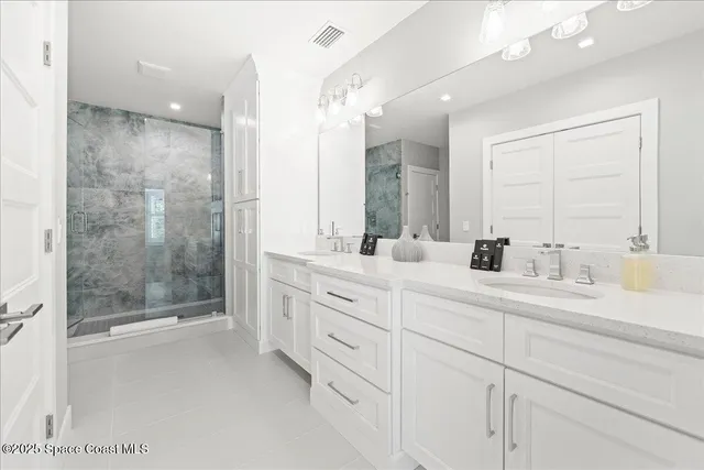 an aerial view of a house with a garden