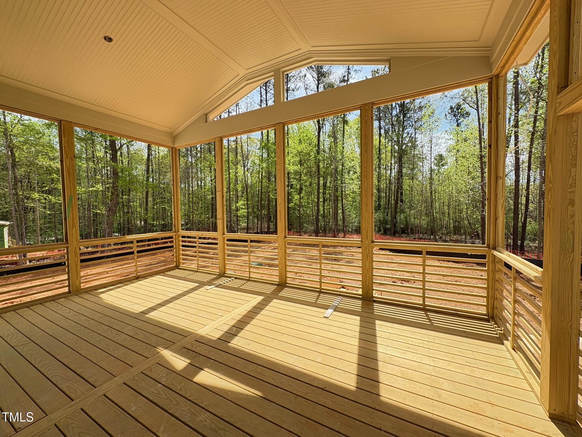 155 Gaines Trail Pittsboro, NC 27312 - Photo 23 of 86 a view of a balcony with wooden floor