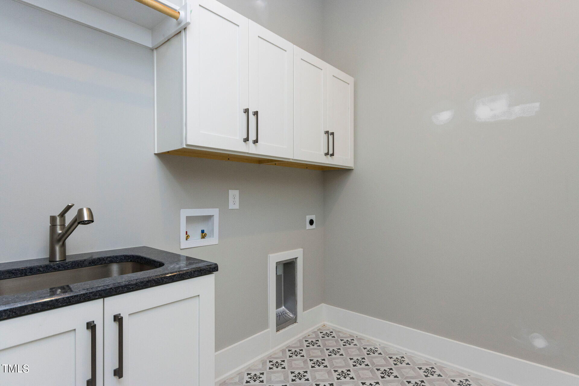 155 Gaines Trail Pittsboro, NC 27312 - Photo 42 of 86 a kitchen with a sink and cabinets