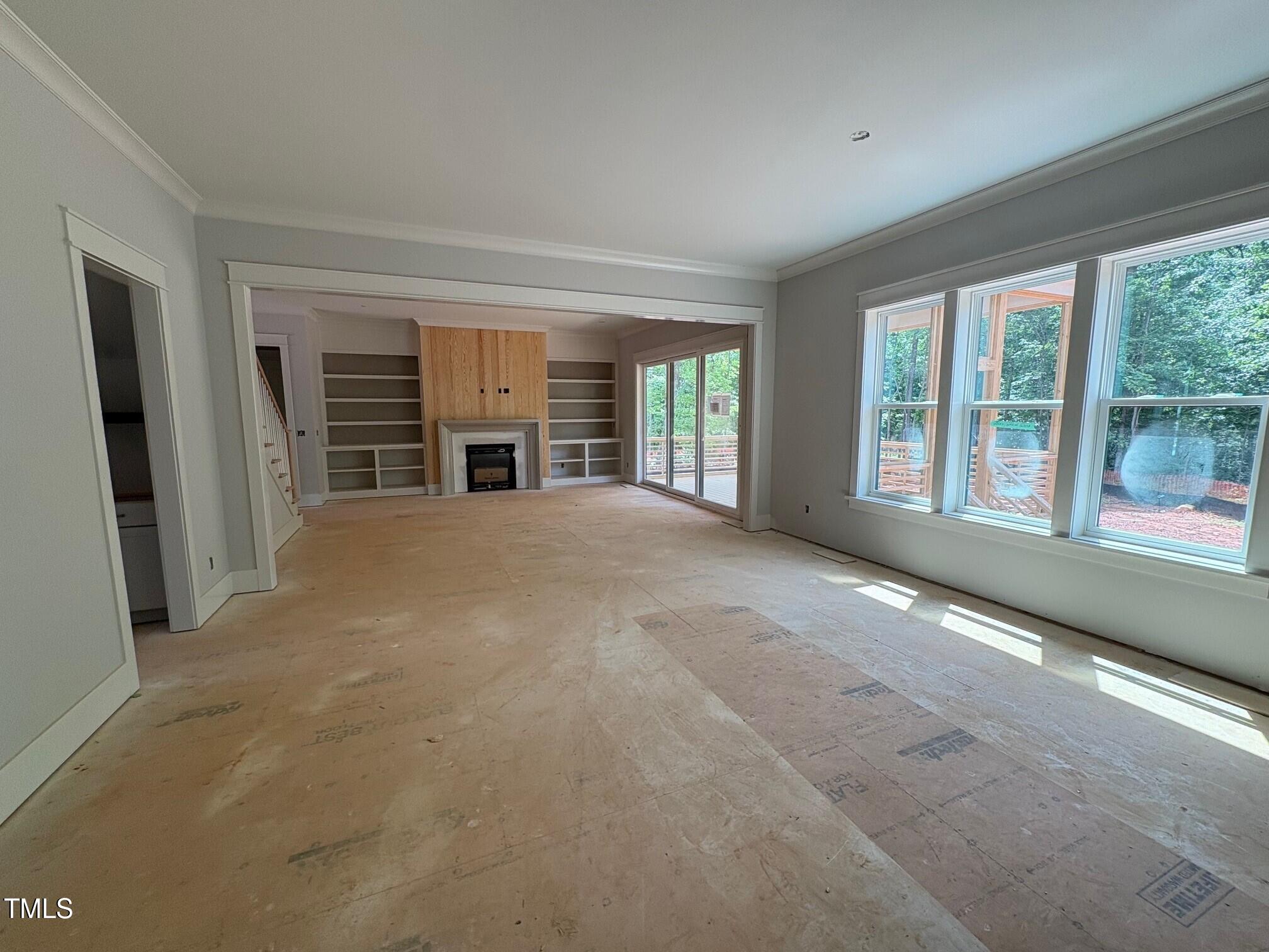 155 Gaines Trail Pittsboro, NC 27312 - Photo 5 of 86 an empty room with windows