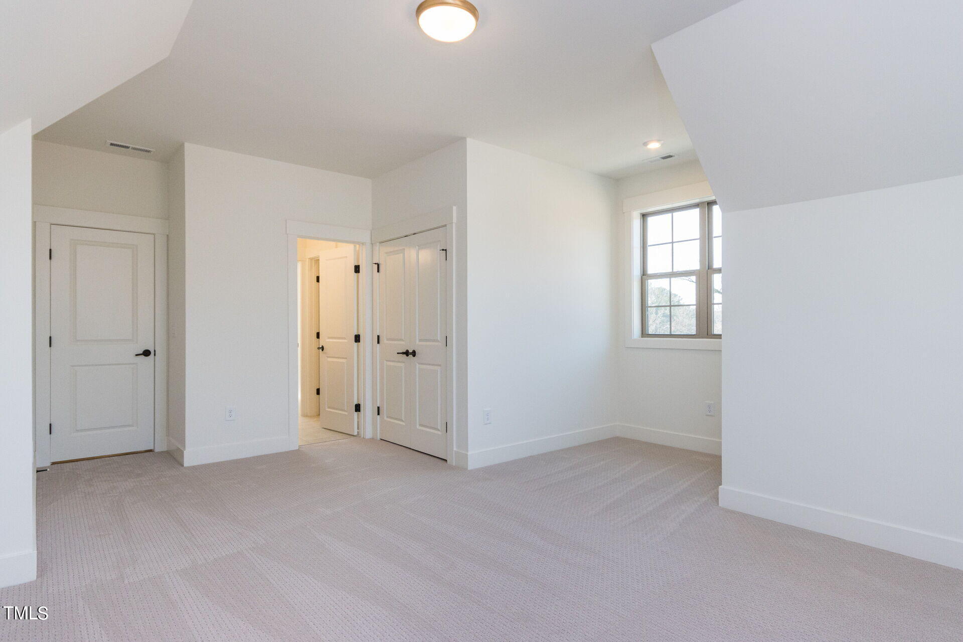 155 Gaines Trail Pittsboro, NC 27312 - Photo 63 of 86 an empty room with windows and closet