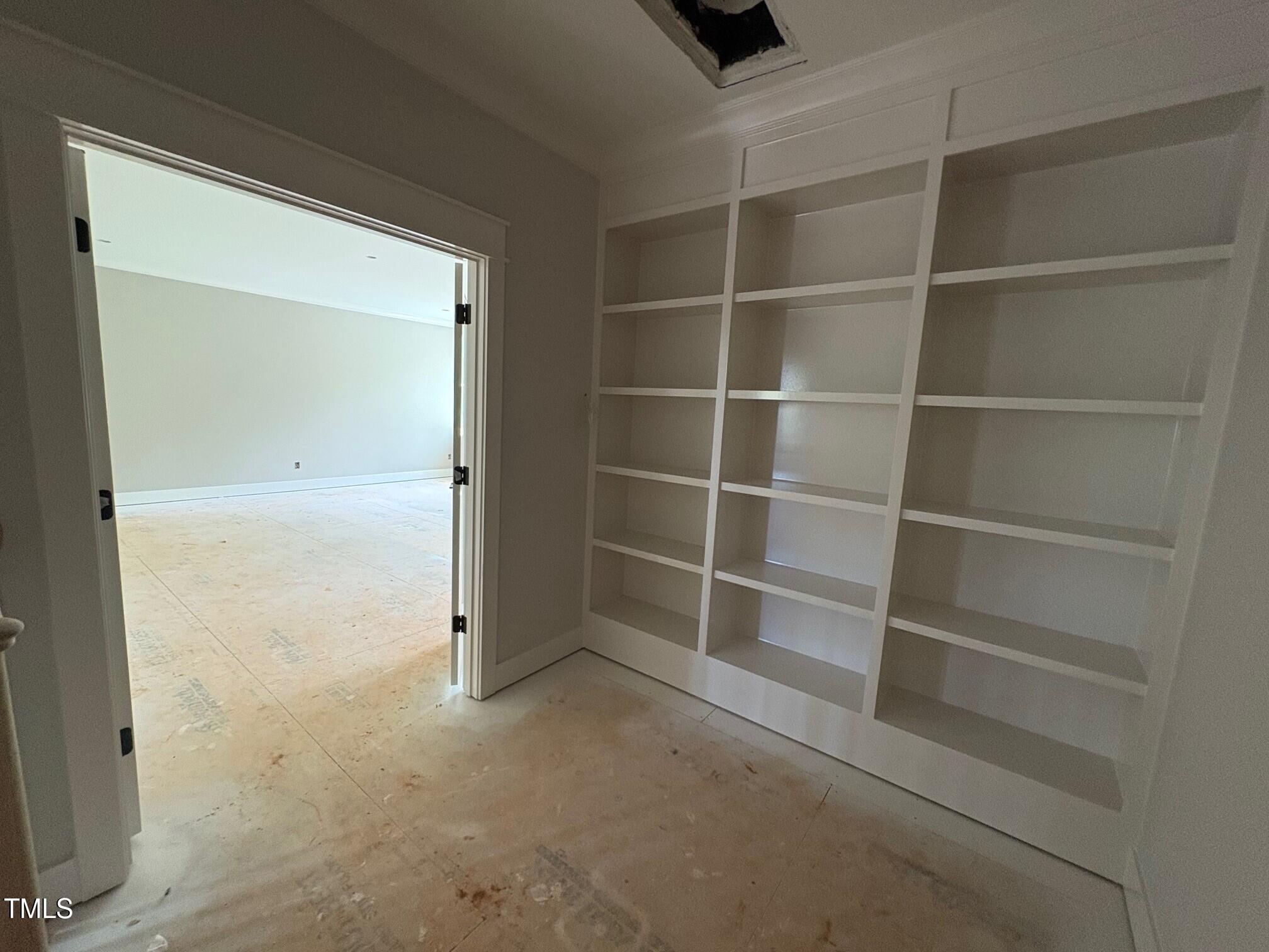 155 Gaines Trail Pittsboro, NC 27312 - Photo 75 of 86 a view of an empty room with empty shelves