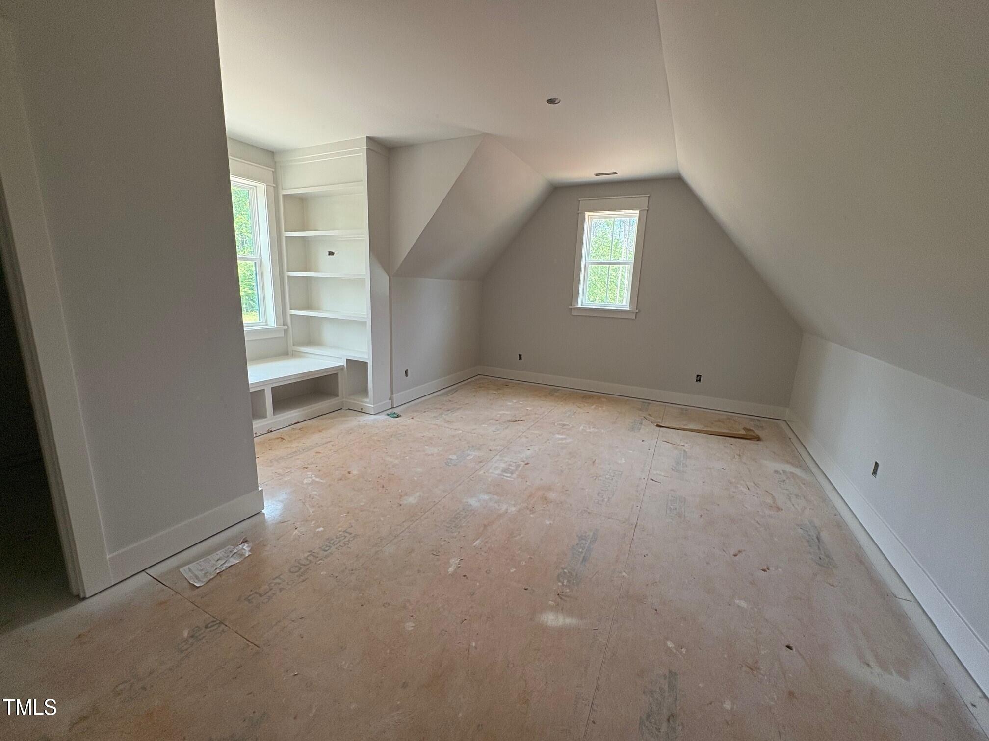 155 Gaines Trail Pittsboro, NC 27312 - Photo 80 of 86 an empty room with windows and closet