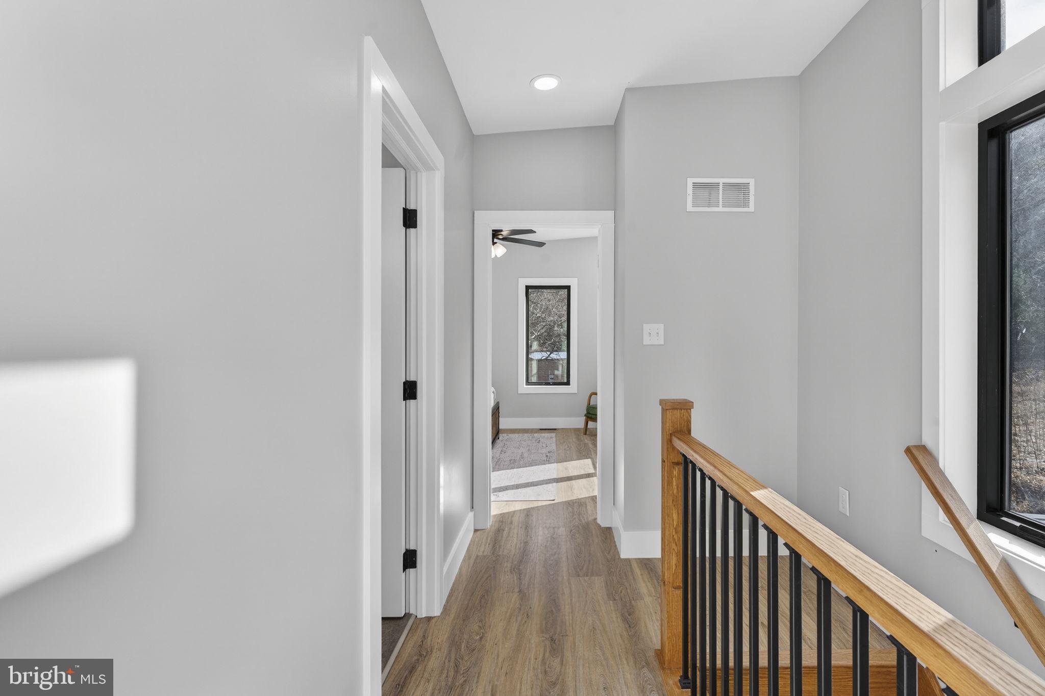 1956 Dove Hollow Road Mathias, WV 26812 - Photo 53 of 113 a view of a hallway with wooden floor