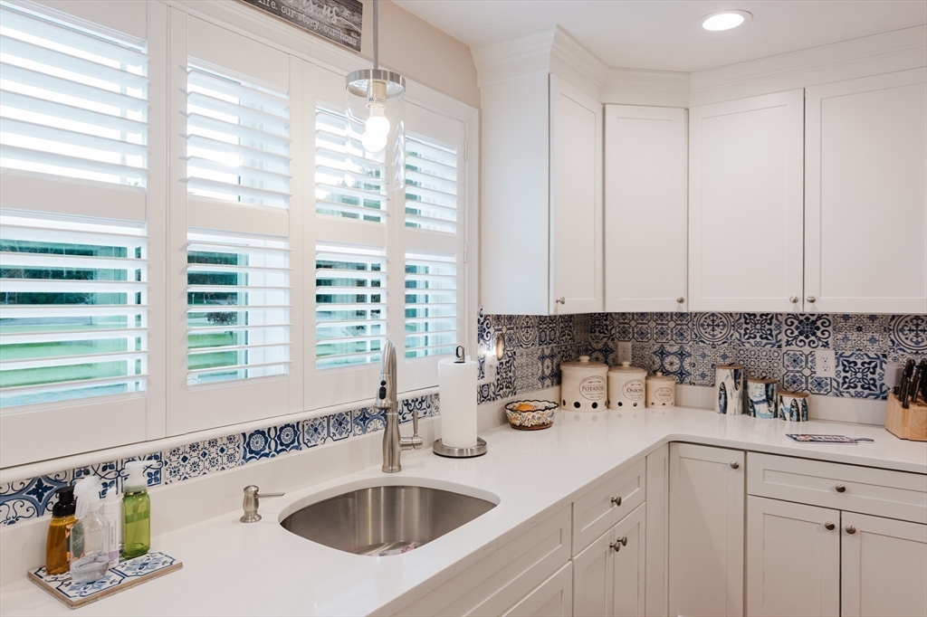 4 Sarah Beth Lane, Unit 1 Wareham, MA 02571 - Photo 25 of 42 a bathroom with a sink and a window