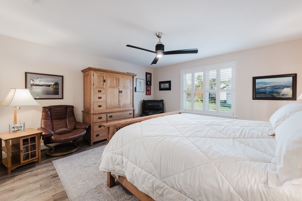 4 Sarah Beth Lane, Unit 1 Wareham, MA 02571 - Photo 30 of 42 a spacious bedroom with a bed a window and dresser