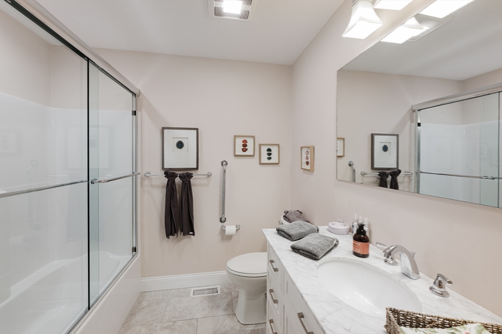 4 Sarah Beth Lane, Unit 1 Wareham, MA 02571 - Photo 36 of 42 a bathroom with a sink toilet and shower