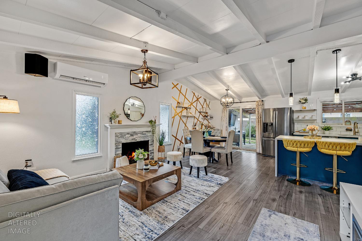 1481 Rieger Avenue Hayward, CA 94544 - Photo 12 of 34 a living room with fireplace furniture and a clock