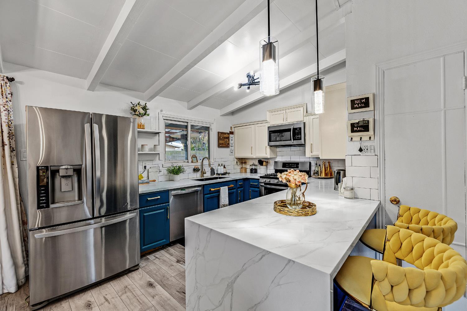 1481 Rieger Avenue Hayward, CA 94544 - Photo 15 of 34 a kitchen with stainless steel appliances granite countertop a sink a stove and refrigerator