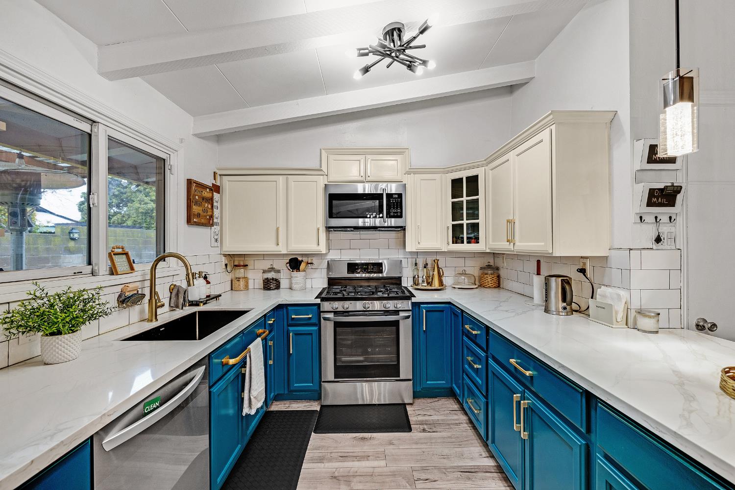 1481 Rieger Avenue Hayward, CA 94544 - Photo 18 of 34 a kitchen with granite countertop a sink stainless steel appliances and counter space