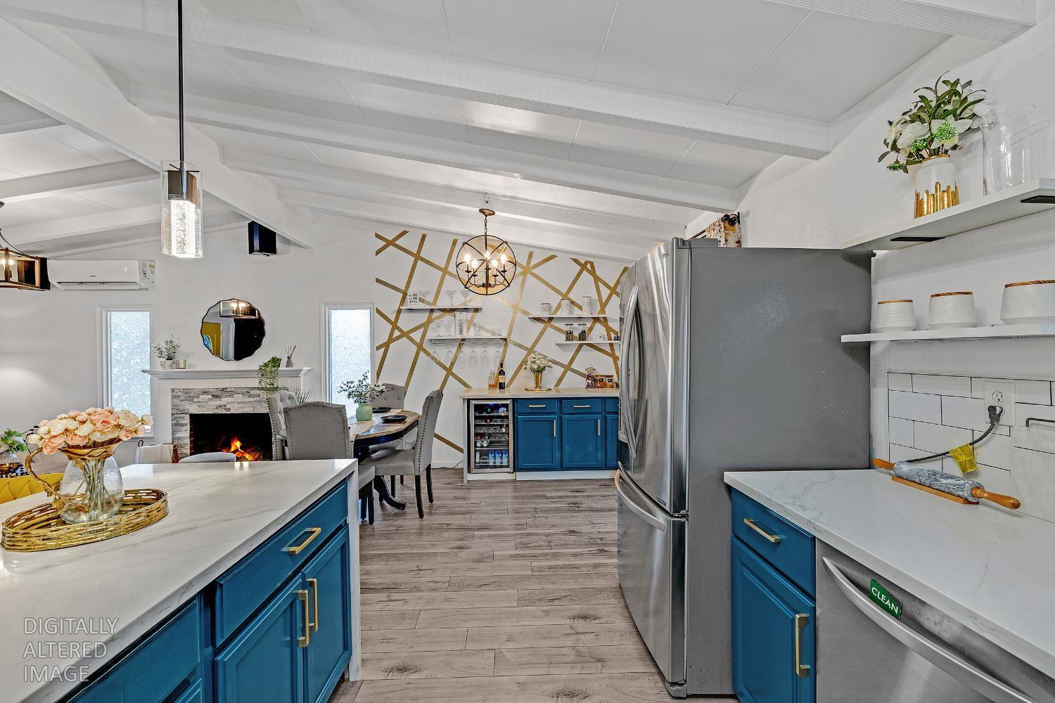 1481 Rieger Avenue Hayward, CA 94544 - Photo 20 of 34 a kitchen with stainless steel appliances granite countertop a sink and a refrigerator