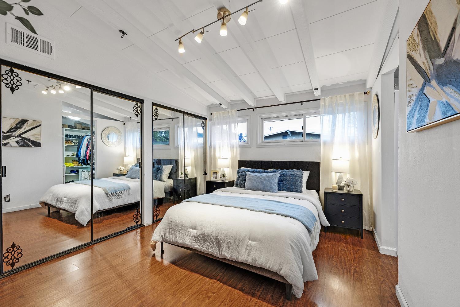 1481 Rieger Avenue Hayward, CA 94544 - Photo 24 of 34 a bedroom with a bed and wooden floor