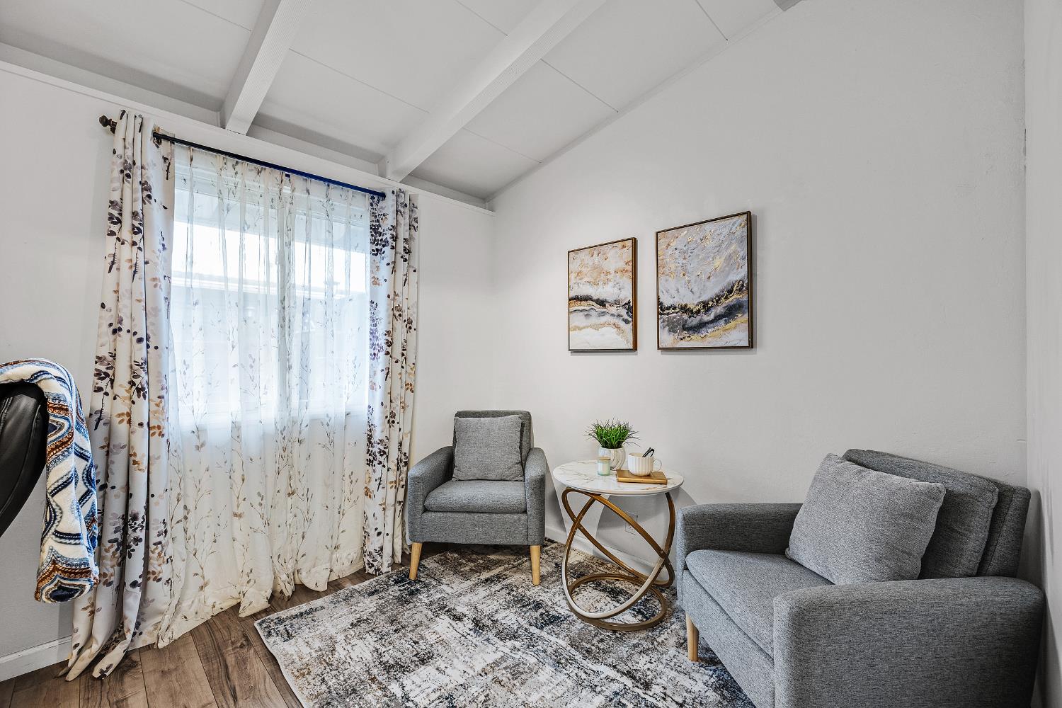 1481 Rieger Avenue Hayward, CA 94544 - Photo 30 of 34 a living room with furniture and a rug